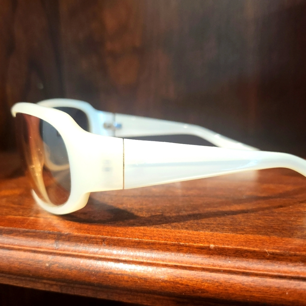 Oliver Peoples White Frames Sunglasses with Amber Gradient Lenses